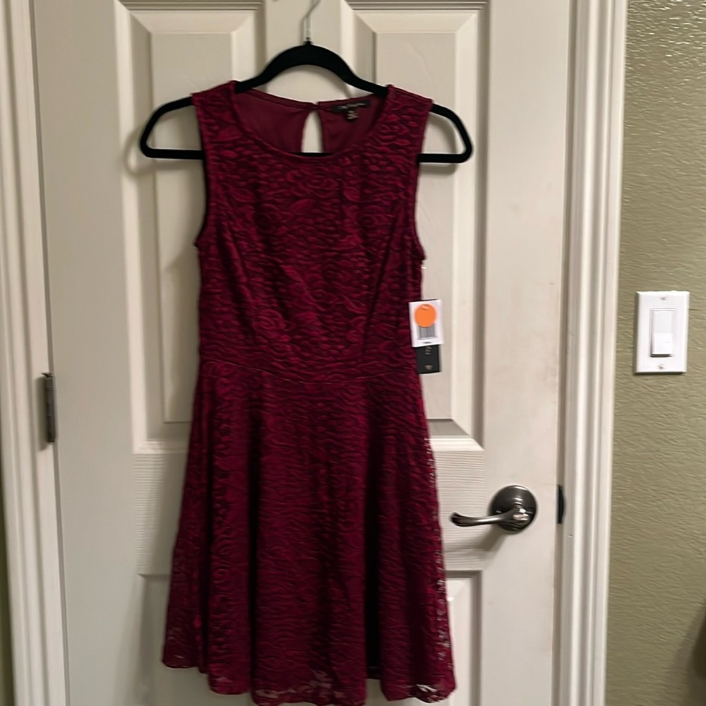 Cute holiday or party dress.  Size XS,, brand new.